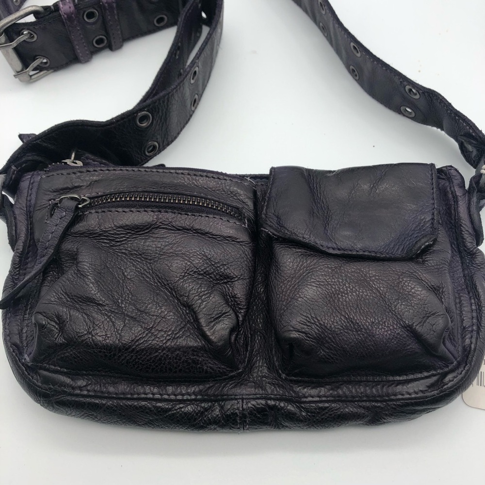 Deep eggplant cow leather crossbody bag. NWT.  Adjustable strap.